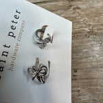 Silver Bow Huggie Earrings Jewelry - Earrings St. Peter Hardware