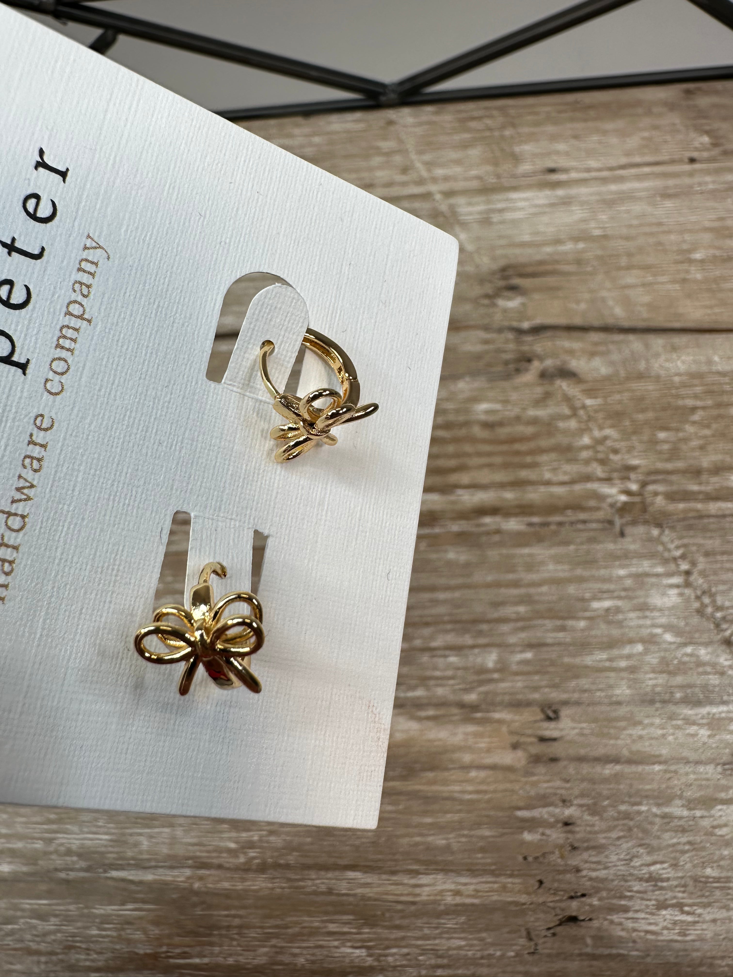 Gold Bow Huggie Earrings Jewelry - Earrings St. Peter Hardware